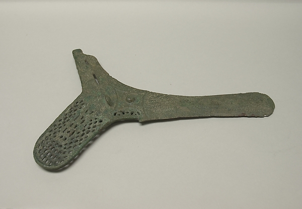 Eccentric Ax Blade with Pierced Decoration