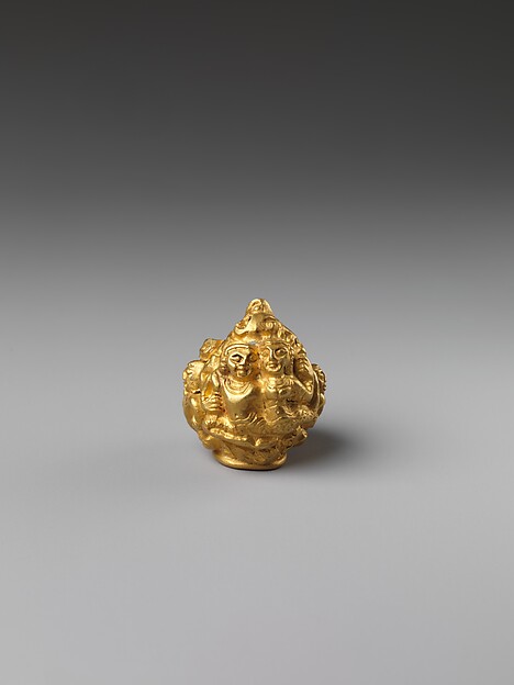 Rod Finial Clip with Deity Surrounded By  Sekti Motif