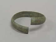 One from a Pair of Undecorated Torqued Anklets