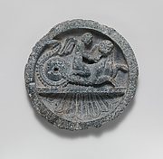 Schist dish with Eros riding a lion-headed sea monster