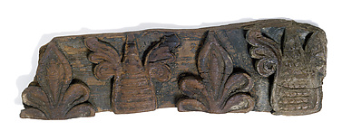 Fragment of a Frieze with Winged Pinecones and Palmettes