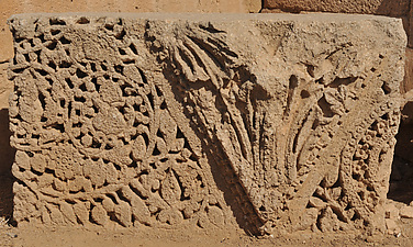 Fragment Carved with Vine Scroll and a Triangle Trimmed with Bead-and-Reel Motif
