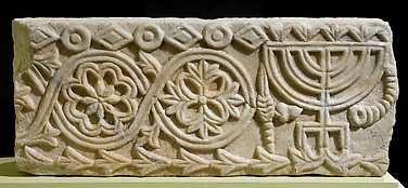 Fragment of a Synagogue Screen with Menorah
