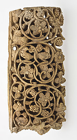Plaque Decorated with Vine Scroll, Birds, and a Rabbit