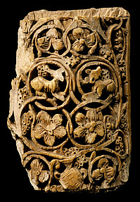 Plaque Decorated with Vine Scroll and Animals