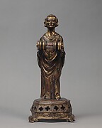 Priest holding a Reliquary