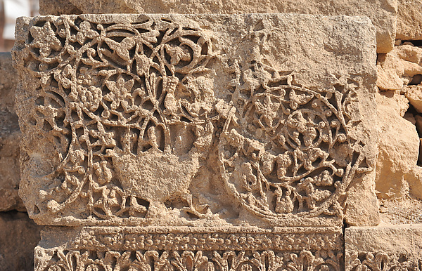 Fragment Carved with Vine Scroll and a Vase