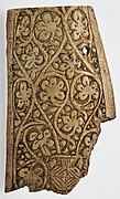 Plaque Decorated with Vine Scroll Springing from a Vase