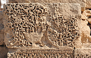 Fragment Carved with Vine Scroll and a Vase