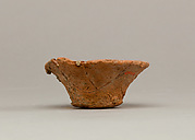 Bowl with stones and carnelian bead