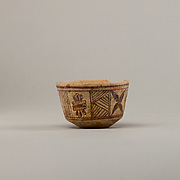 Bowl with floral and geometric designs