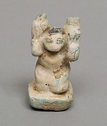 Figure of Servant carrying jars