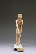 Statue of man hoeing from tomb of Tjeteti