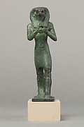 Statuette of Horus with a vessel