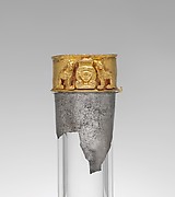 Neck from a vessel depicting the goddess Hathor flanked by felines