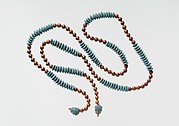 String of Beads with Feline-head Amulets