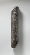 Fragment of a Statue of Haremhab bearing a standard