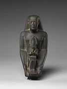 Padiamunrenebwaset, son of Irethoreru, holding a seated statue of Osiris