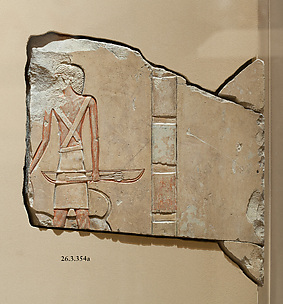 Relief, tomb of Khety: baboon and man with bow; inscription on side- see 26.3.354-4