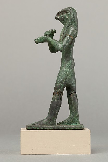 Statuette of Horus with a vessel
