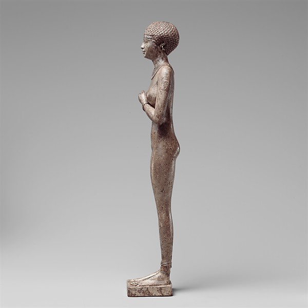 Statuette of a Royal (?)  Woman with the Cartouches of Necho II on her Arms