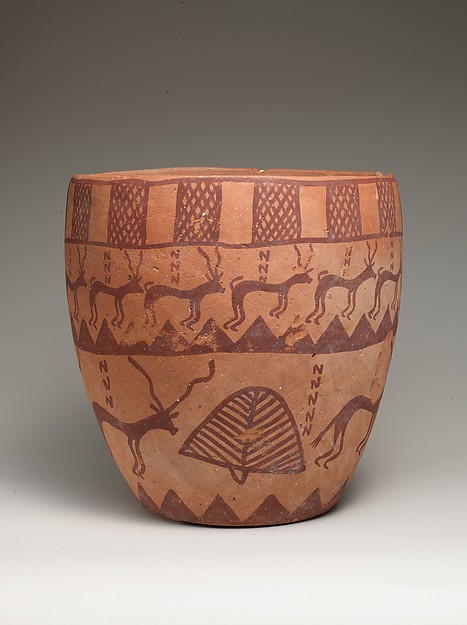 Deep bowl depicting people, animals, and plants