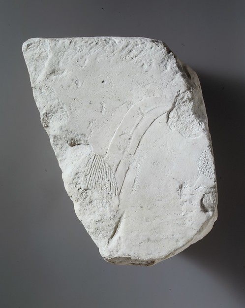 Relief fragment: foreigner with feather in his hair and Nubian