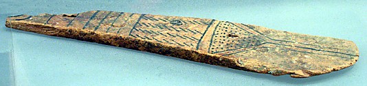 Fragment of a Paddle Doll
