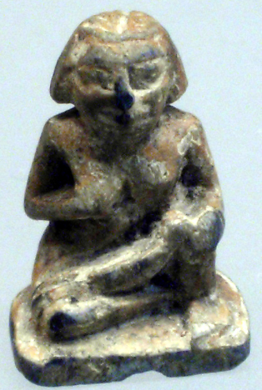 Design Amulet, Woman Suckling a Child on Back, Device showing Geometricized Monkeys