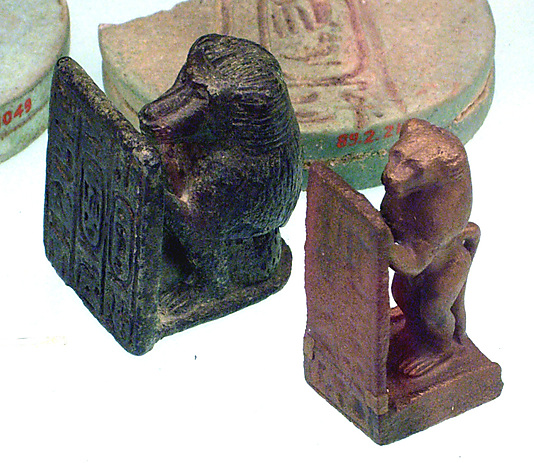 Baboon holding a stela with the name Khnemibre (Amasis)