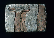 Relief fragment with a male figure