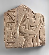 Relief of a goddess offering a palm rib