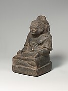 Statue of a scribe with a baboon