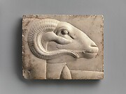 Relief plaque with ram's head from a god's figure