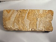 Relief with people setting down braziers