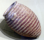 Decorated ware jar with wavy bands