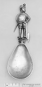 Figure-top spoon