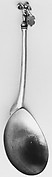 Figure-top spoon