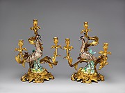 Pair of candelabra with Meissen bird