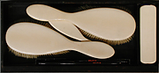 Two clothes brushes