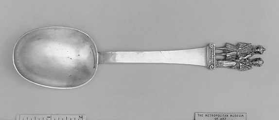 Figure-top spoon