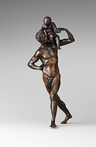 Man Carrying a Child on His Shoulder