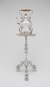 Teakettle, lamp, and table