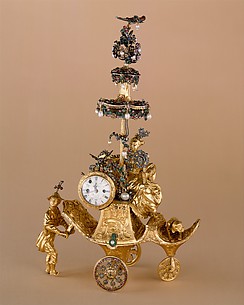 Automaton in the form of a chariot pushed by a Chinese attendant and set with a clock