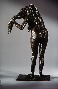 Woman Arranging her Hair