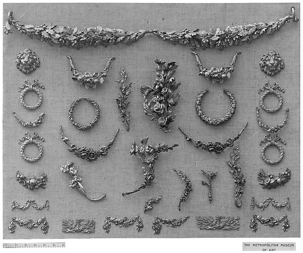 Pair of clock ornaments