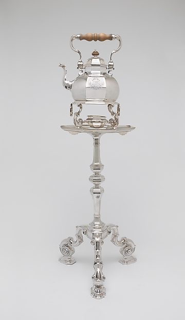 Teakettle, lamp, and table