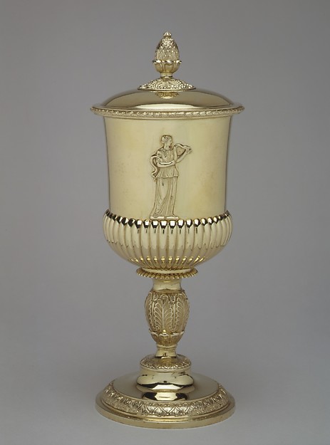 Cup with cover with a leather case