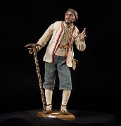 Man with staff and brace of birds