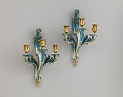 Pair of three-light wall sconces